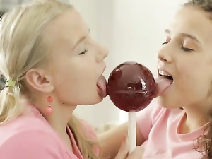 Pigtailed Teen Girlfriends Share A Lollipop And Finger Pussy